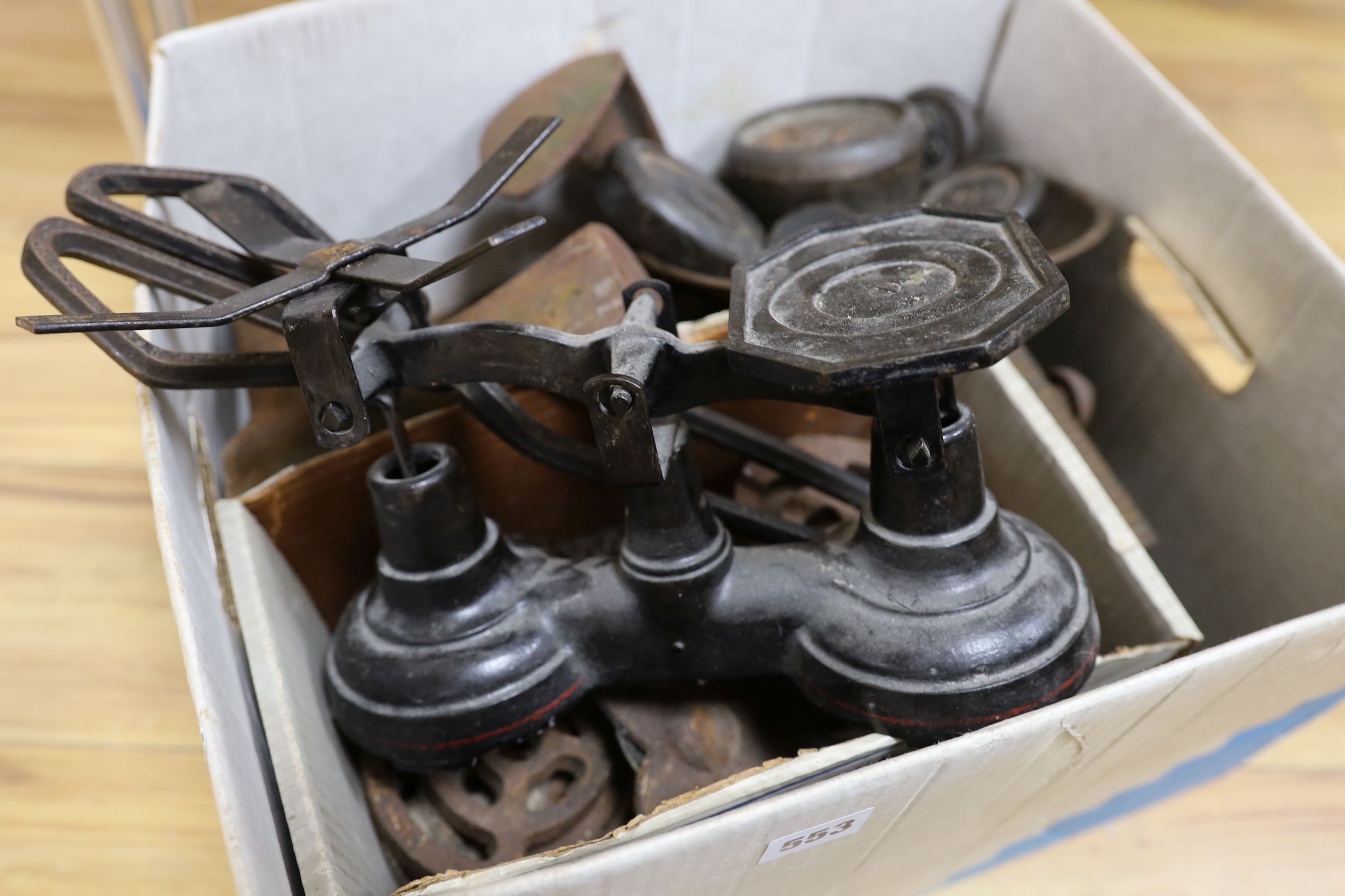 A cast iron boot scraper, weighing scales etc